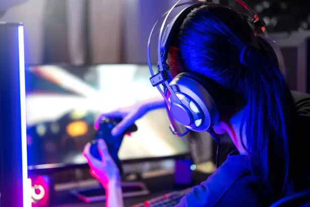 gamer wear headphone competition play video game